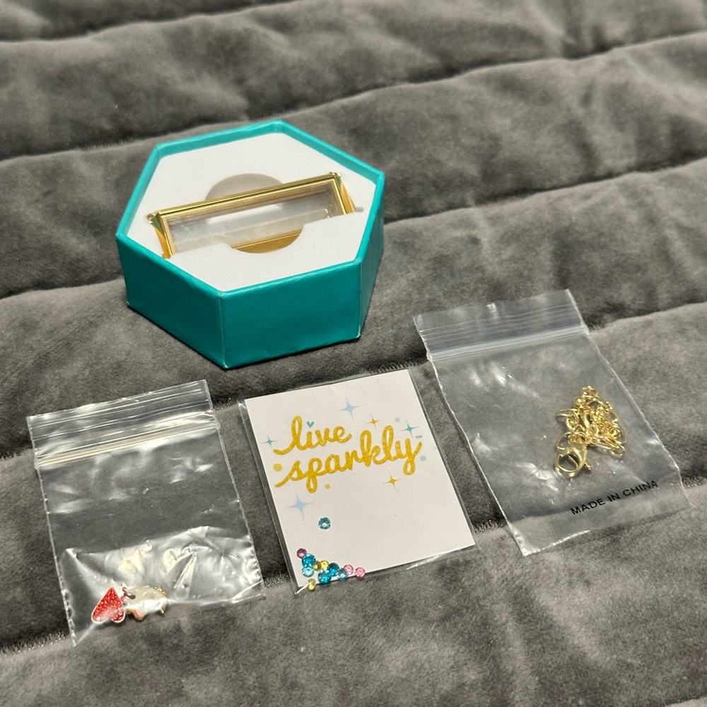 Origami Owl Bar Necklace with unicorn charms